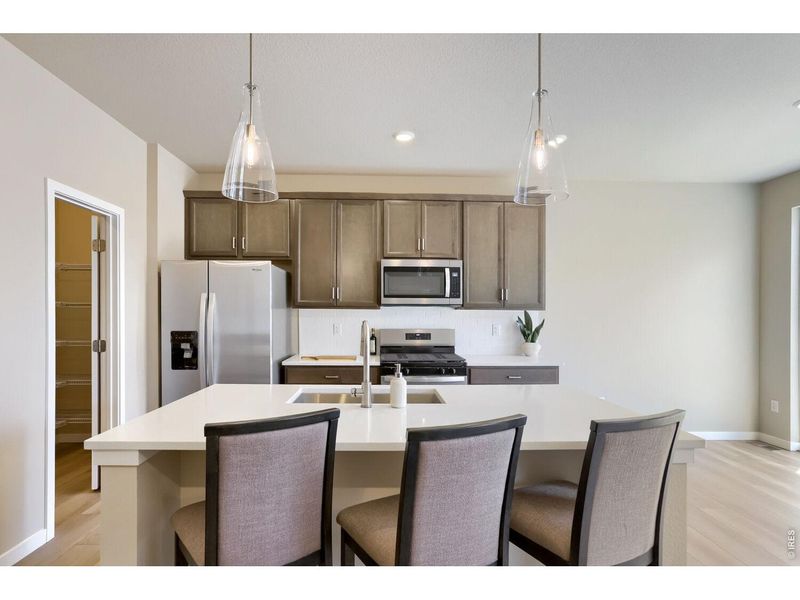 Furnished interior view inside a new home in Farmstead, Berthoud (Image 6).