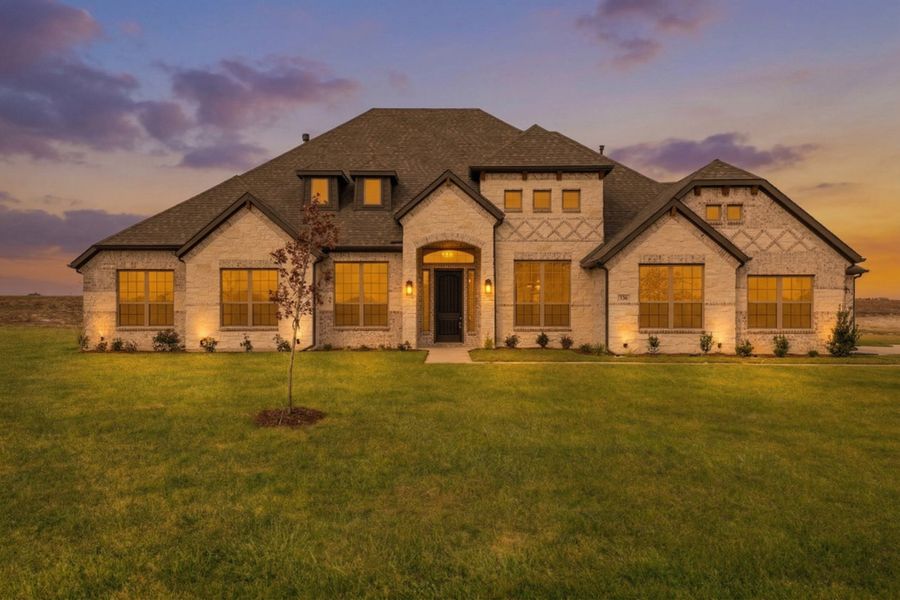 Front exterior of a new home in Levante, Waxahachie, TX, highlighting curb appeal (Image 2). Front exterior of a new home in Levante, Waxahachie, TX, highlighting curb appeal (Image 2).