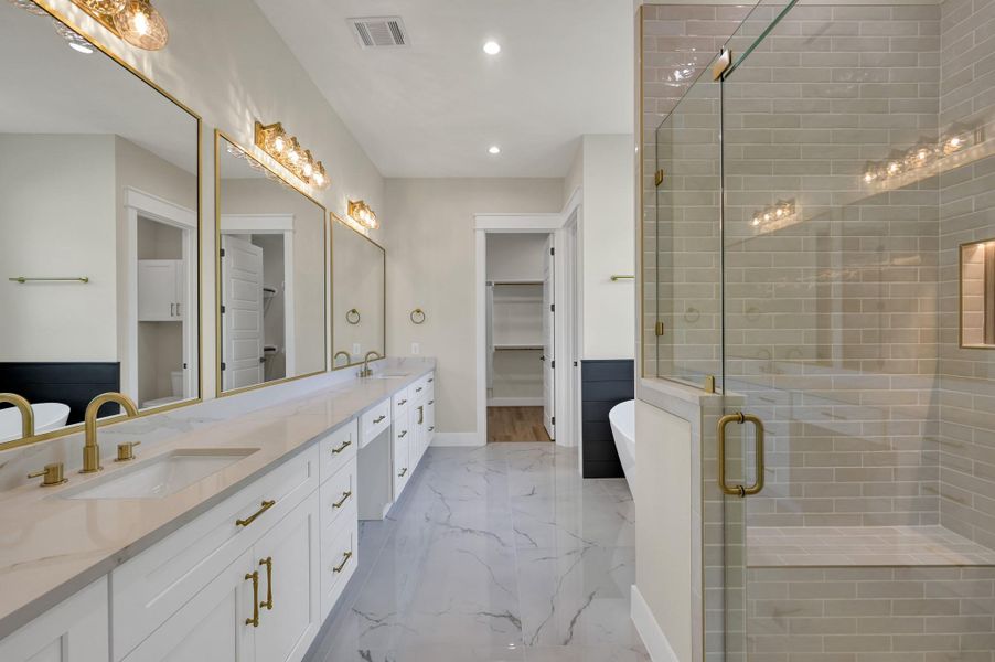 Spa Like Primary Bathroom with Huge Vanity, Walk-in Shower, and Soaker Tub Spa Like Primary Bathroom with Huge Vanity, Walk-in Shower, and Soaker Tub