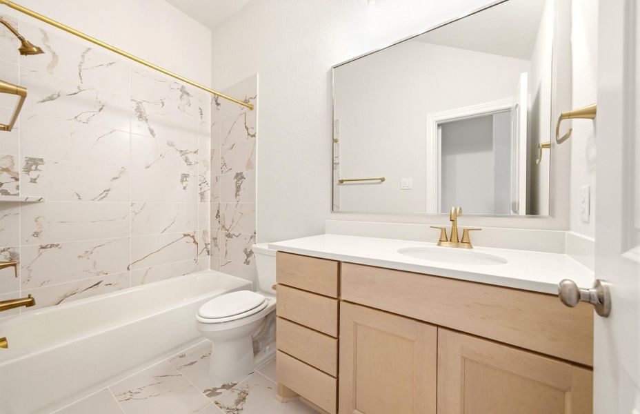 Furnished interior view inside a new home in The Woodlands Hills 65′, Willis (Image 10).