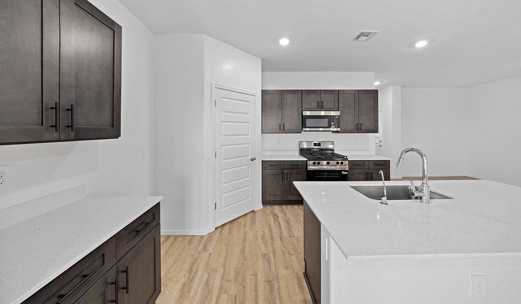Representative furnished interior of a home built from the Lakeway - H40L by D.R. Horton in Sycamore Vista, Vail (Image 8).