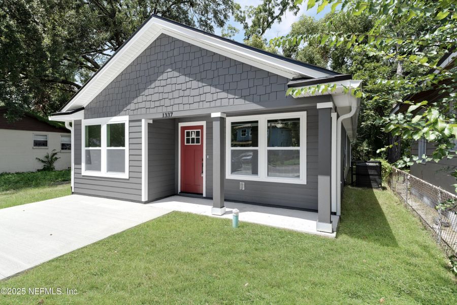Front exterior of a new home in , Jacksonville, FL, highlighting curb appeal (Image 12). Front exterior of a new home in , Jacksonville, FL, highlighting curb appeal (Image 12).