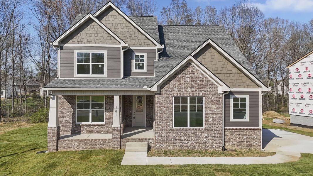 Representative exterior photo of a completed home built from the Two Story Farmhouse by Norfleet Builders in Cambria, White House, TN (Image 1).
