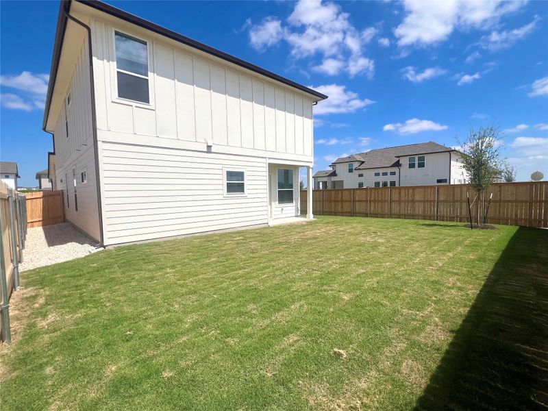 Exterior details and patio area of a home in Porter Country, Buda (Image 3).