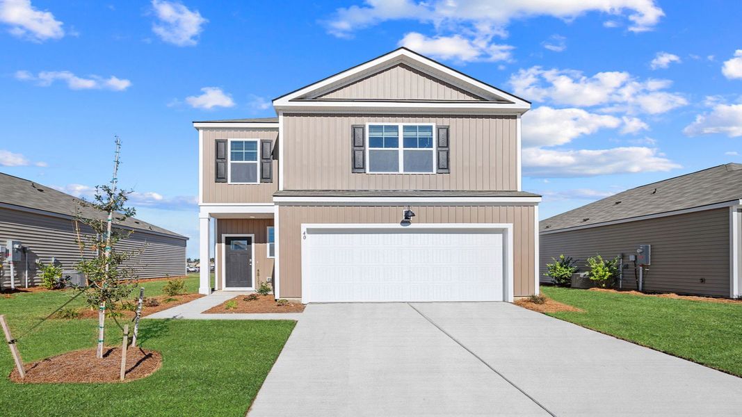 Representative exterior photo of a completed home built from the Manning by D.R. Horton in Holly Oaks, Statesboro, GA (Image 13).