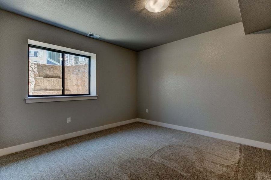 Bedroom in Optional Finished Basement - Not Actual Home - Finishes May Vary