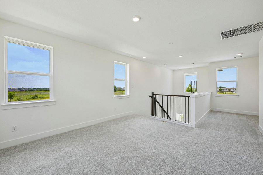 Spacious, unfurnished interior of a new home in Avery Centre, Round Rock (Image 36).