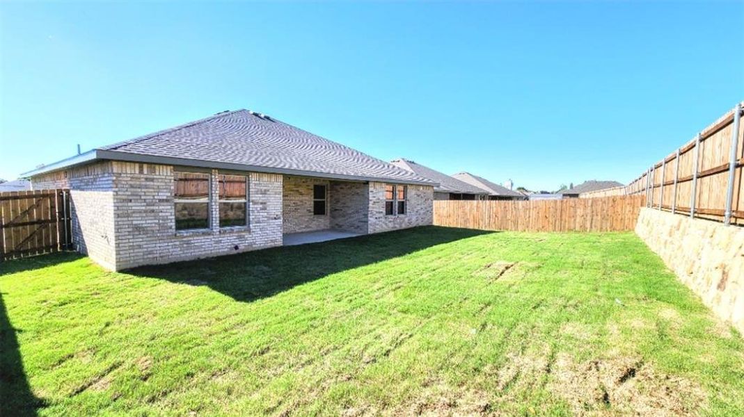 Rear Elevation and covered back Patio