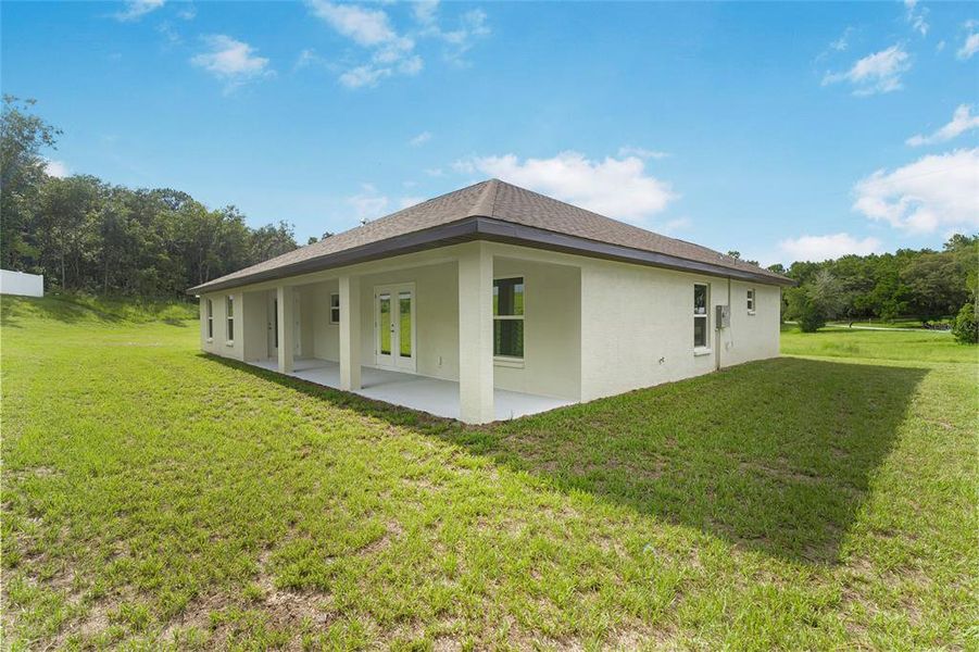 Front exterior of a new home in , Citrus Springs, FL, highlighting curb appeal (Image 2). Front exterior of a new home in , Citrus Springs, FL, highlighting curb appeal (Image 2).