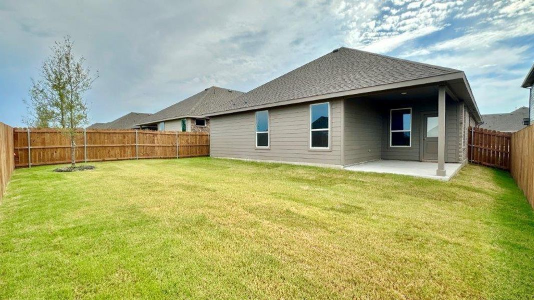 Front exterior of a new home in Rock Creek Ranch, Fort Worth, TX, highlighting curb appeal (Image 2). Front exterior of a new home in Rock Creek Ranch, Fort Worth, TX, highlighting curb appeal (Image 2).