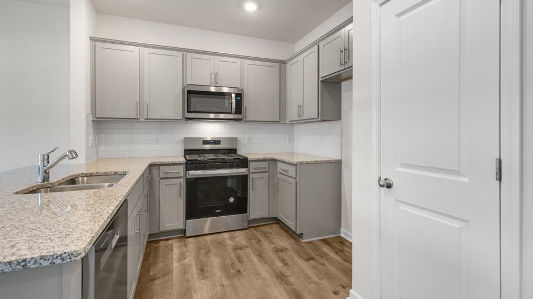 Furnished interior view inside a new home in Clock Road Townhomes, New Bern (Image 5).