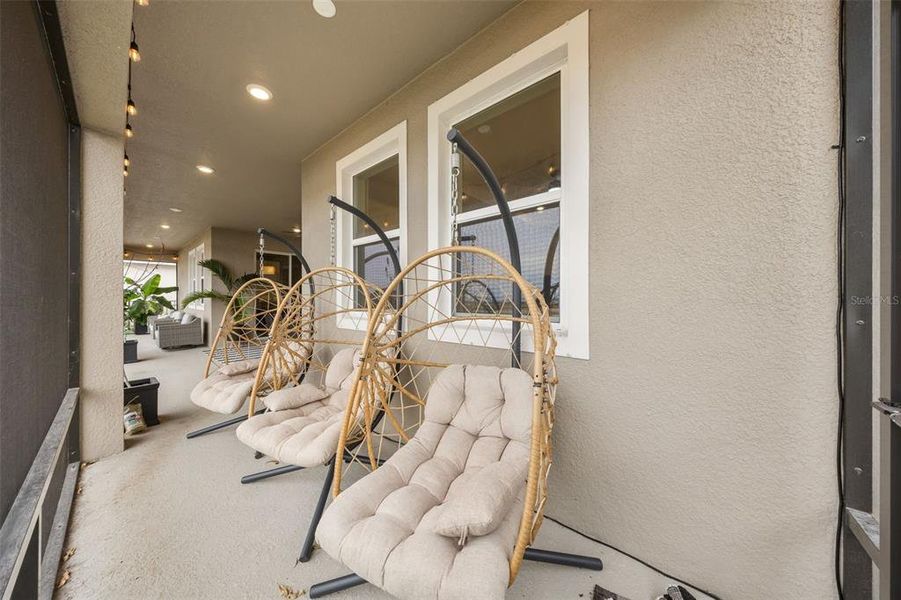 Exterior details and patio area of a home in Seaire, Parrish (Image 28).