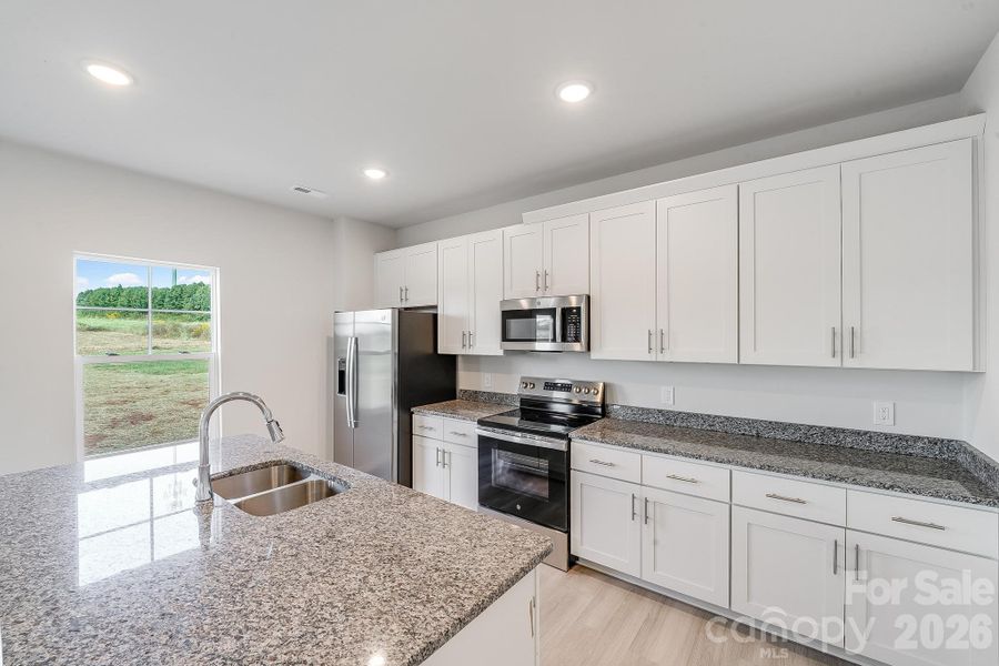 Furnished interior view inside a new home in , Statesville (Image 3). Furnished interior view inside a new home in , Statesville (Image 3).