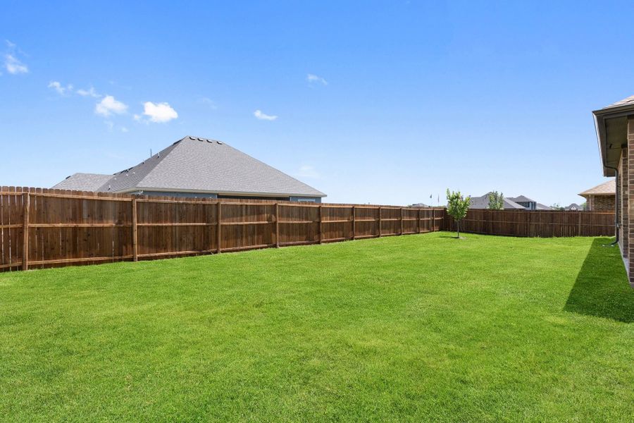 Front exterior of a new home in Waverly Estates, Nevada, TX, highlighting curb appeal (Image 75).