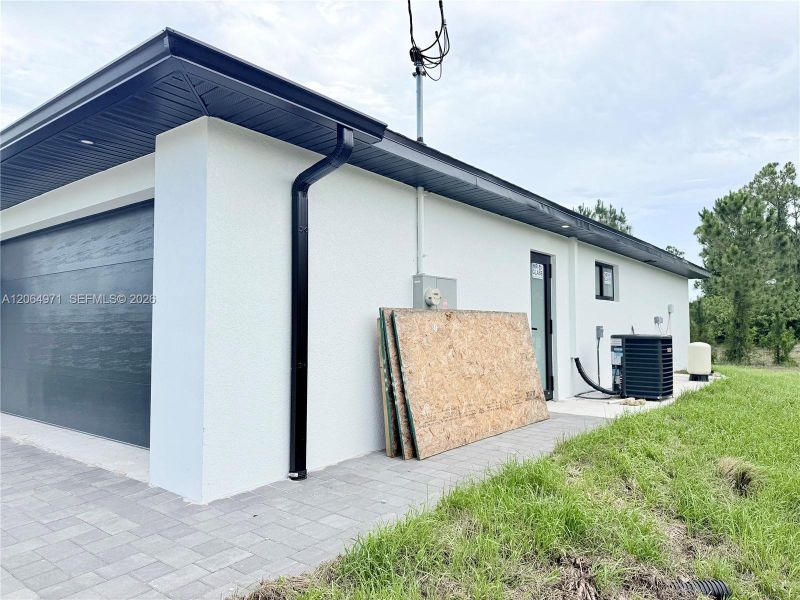 Exterior details and patio area of a home in , Lehigh Acres (Image 4).
