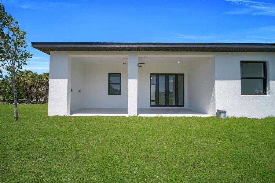 Exterior details and patio area of a home in , Lehigh Acres (Image 4).