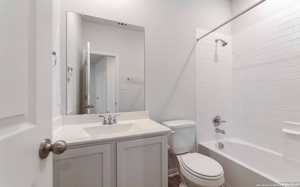 Furnished interior view inside a new home in Hennersby Hollow, San Antonio (Image 5).