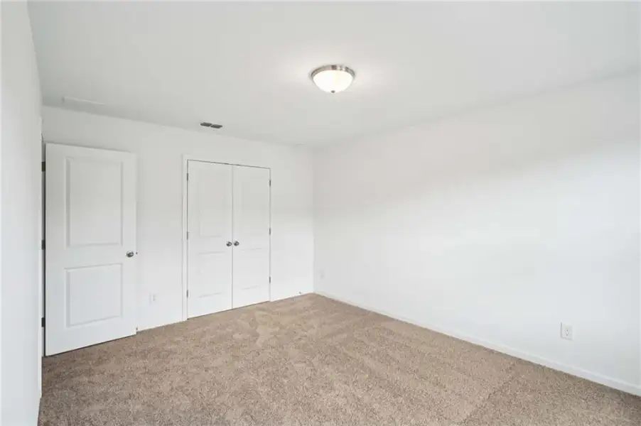 Spacious, unfurnished interior of a new home in Eastlyn Crossing, Flowery Branch (Image 28). Spacious, unfurnished interior of a new home in Eastlyn Crossing, Flowery Branch (Image 28).
