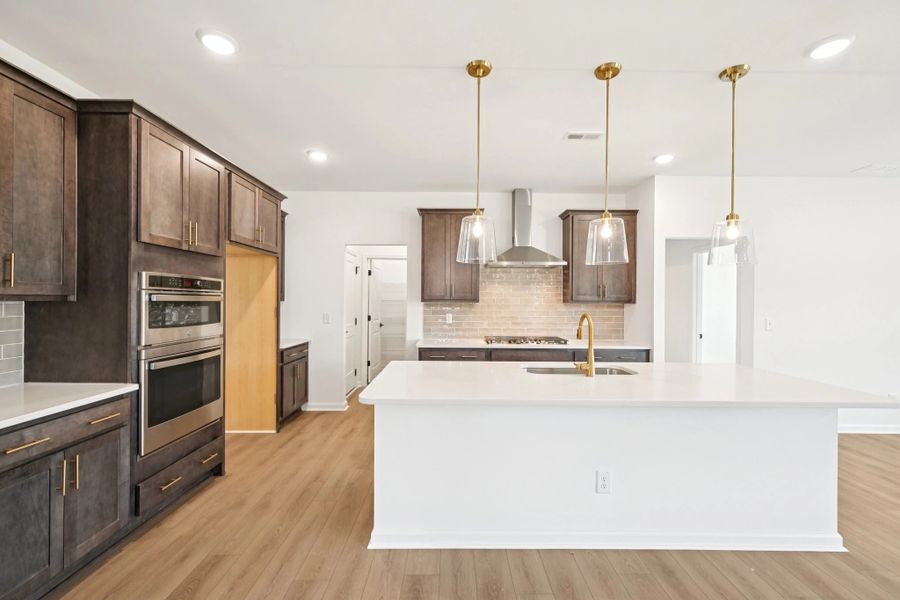 Kitchen featuring AW Collection® Oxford - Matte finishes, light wood, and refined style. Kitchen featuring AW Collection® Oxford - Matte finishes, light wood, and refined style.