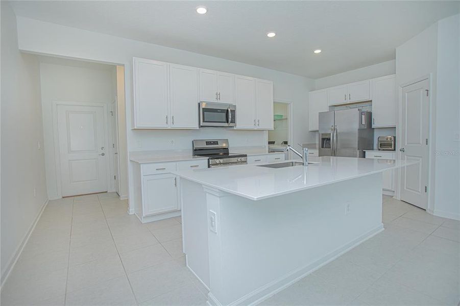 Furnished interior view inside a new home in Tohoqua, Kissimmee (Image 8).