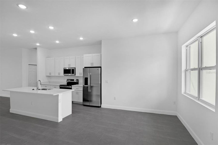 Furnished interior view inside a new home in , Dunnellon (Image 6).