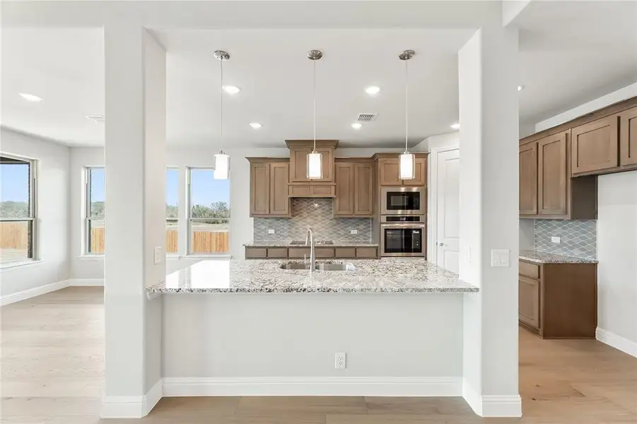 Furnished interior view inside a new home in Crystal Lake Estates, Red Oak (Image 6).