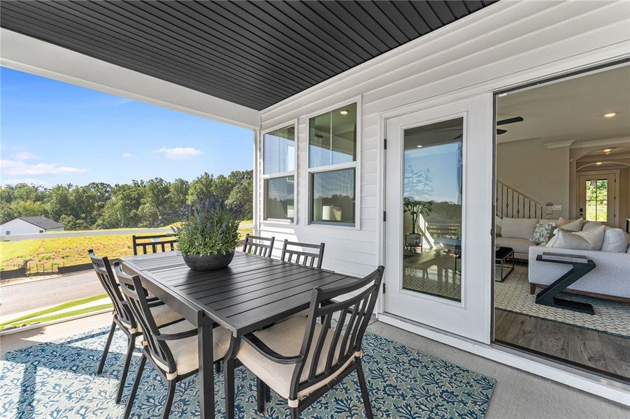 Enjoy outdoor living on this inviting patio with p