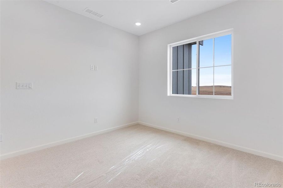 Spacious, unfurnished interior of a new home in Reunion, Commerce City (Image 43).