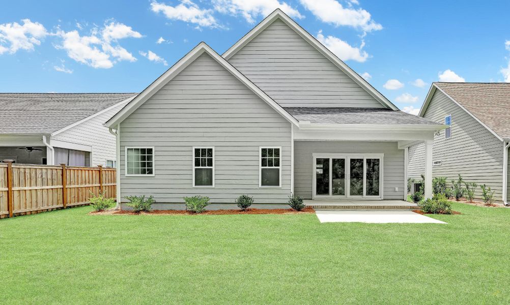 Representative exterior photo of a completed home built from the Banks by Bill Clark Homes in The Sanctuary at Sunset Beach, Sunset Beach, NC (Image 21). Representative exterior photo of a completed home built from the Banks by Bill Clark Homes in The Sanctuary at Sunset Beach, Sunset Beach, NC (Image 21).