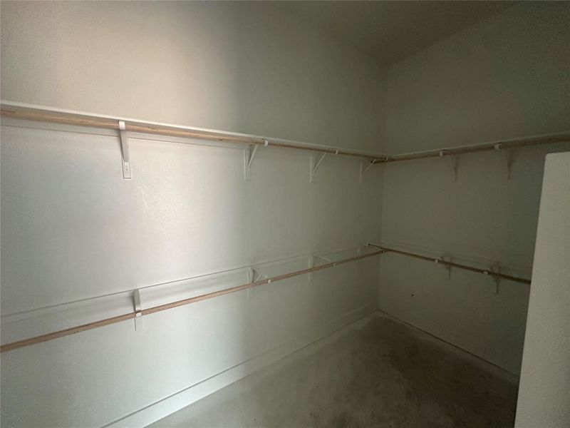 Walk-in closet in Primary Bedroom