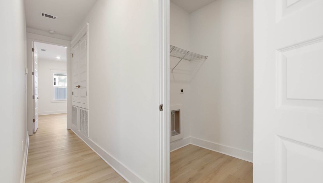 Representative unfurnished interior of a home built from the Ava by D.R. Horton in Parkside, Santa Rosa Beach (Image 28).