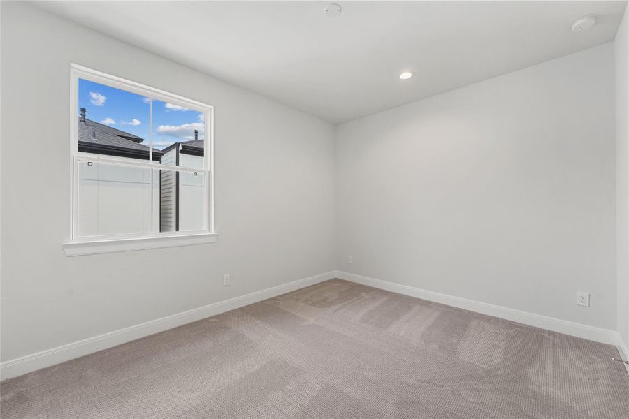Spacious, unfurnished interior of a new home in The Corner At Buffalo Pointe, Houston (Image 31).