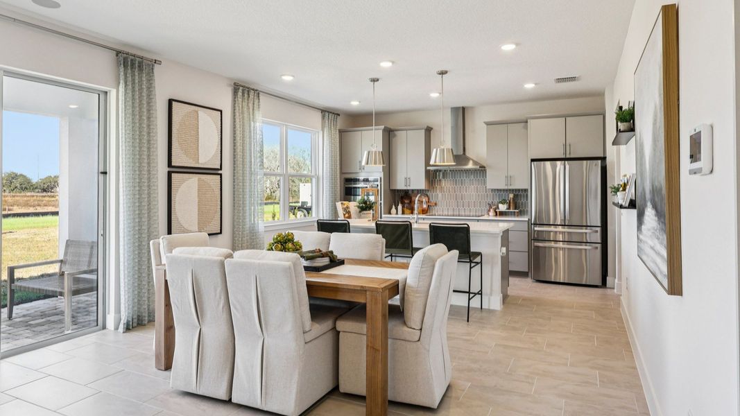 The Mangrove Model Floorplan Dining Area and Kitchen by DRB Homes