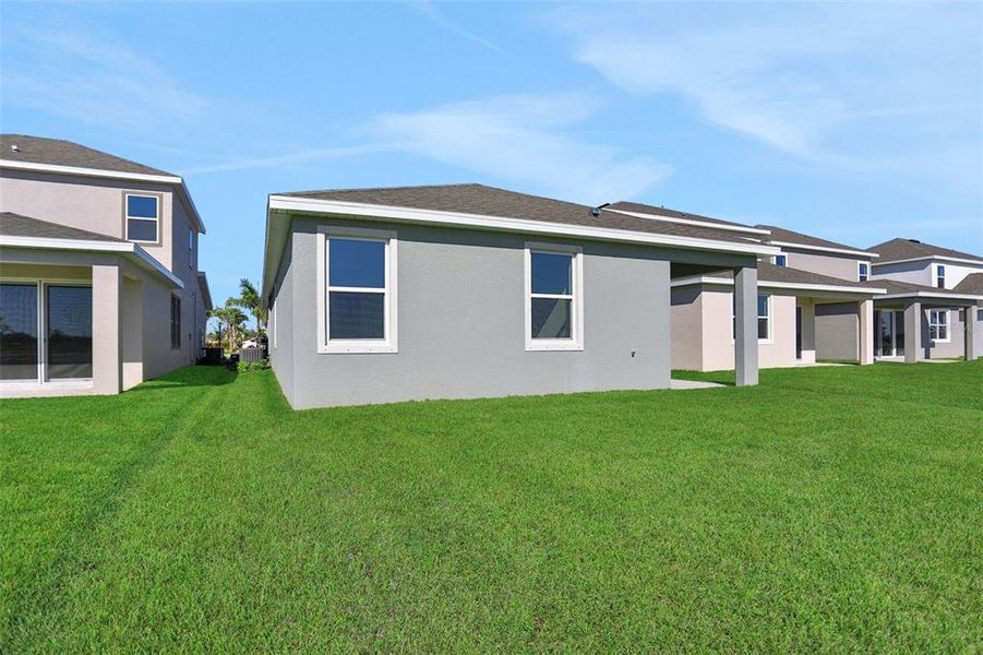 Exterior details and patio area of a home in Turnleaf, Punta Gorda (Image 4).