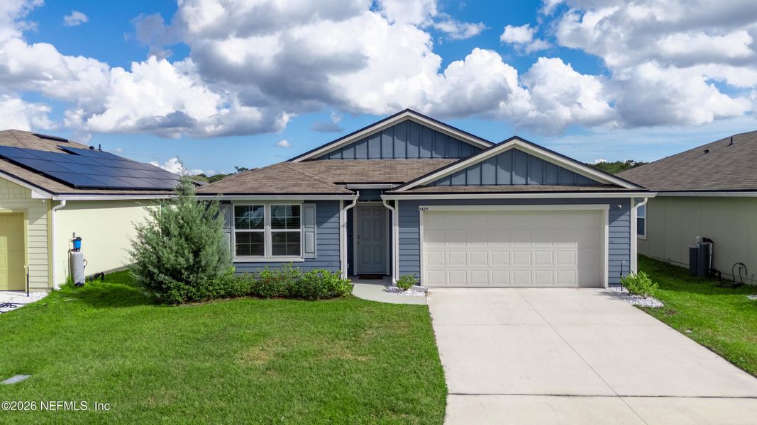 Front exterior of a new home in Copes Landing, Jacksonville, FL, highlighting curb appeal (Image 1). Front exterior of a new home in Copes Landing, Jacksonville, FL, highlighting curb appeal (Image 1).