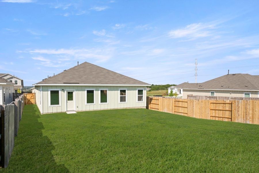 Exterior details and patio area of a home in Cloverleaf, Austin (Image 4).