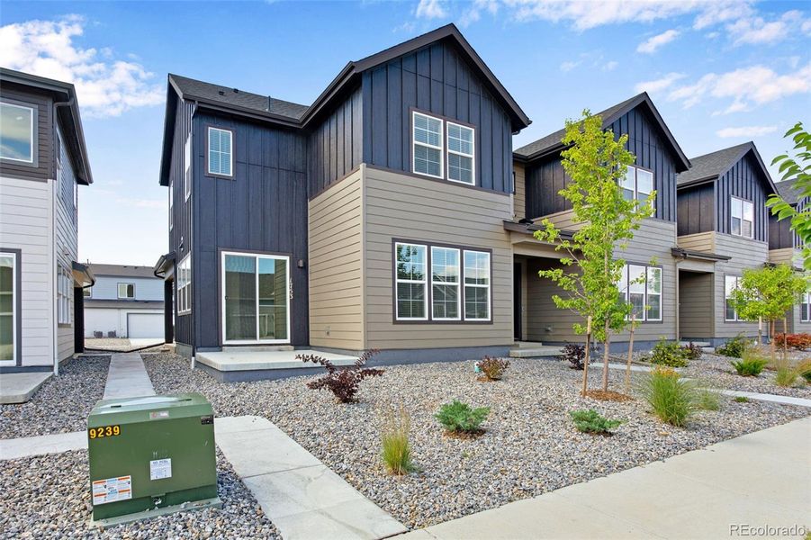 Front exterior of a new home in , Berthoud, CO, highlighting curb appeal (Image 26).