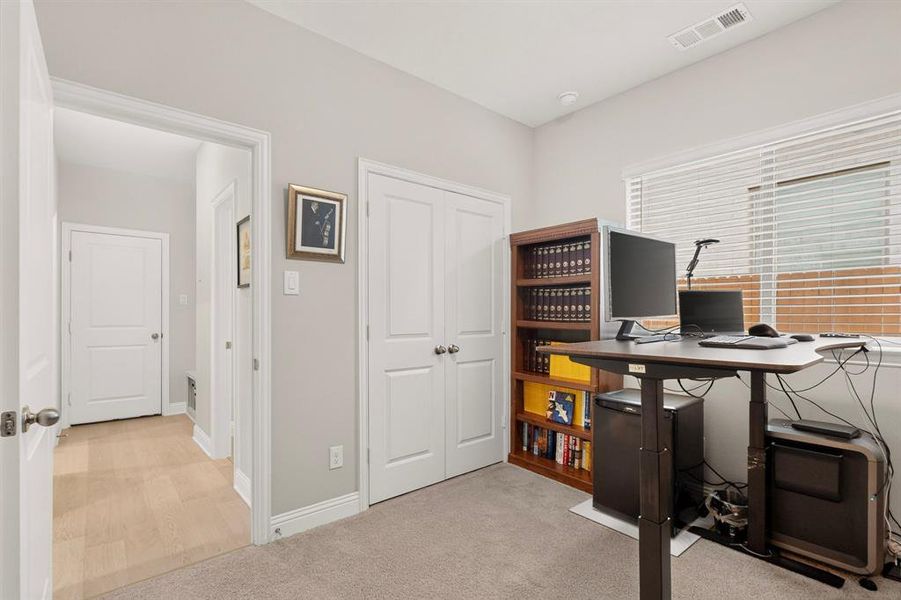 secondary bedroom on 1st floor. Currently used as office