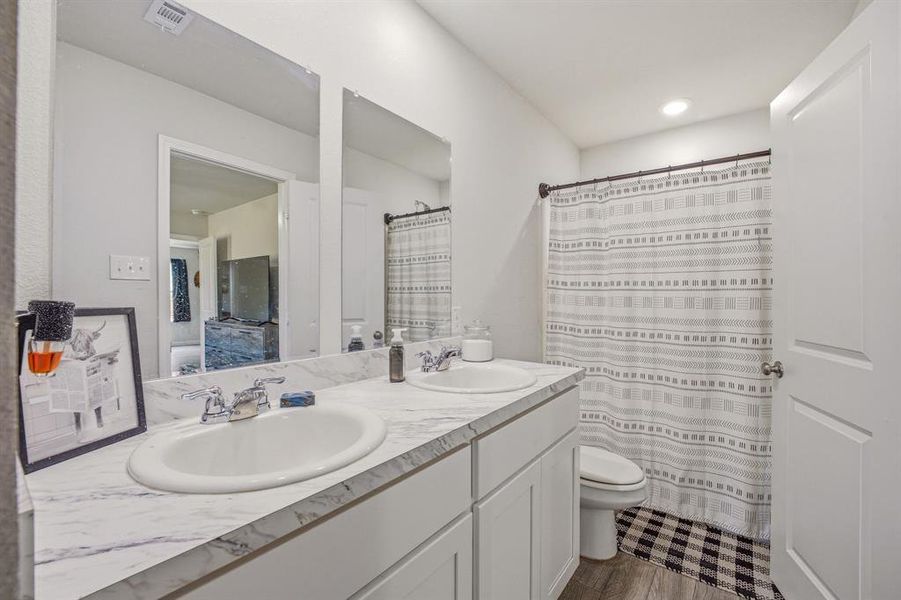Furnished interior view inside a new home in Tolar Oaks, Tolar (Image 11).