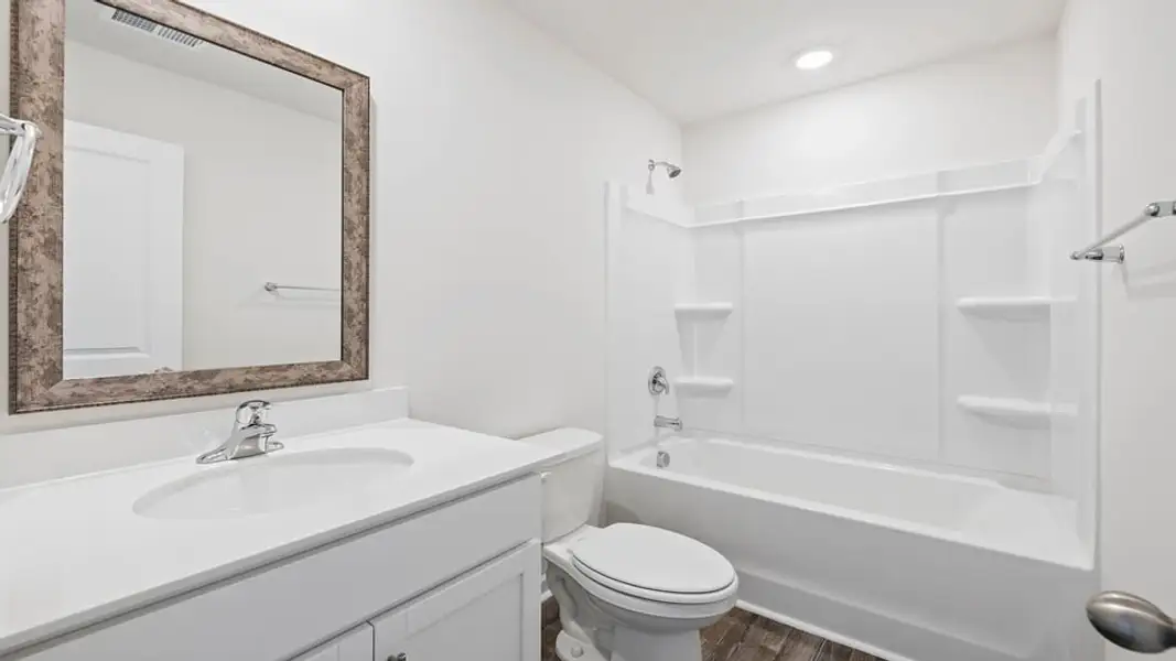 Furnished interior view inside a new home in Harper Ridge, Roebuck (Image 13).