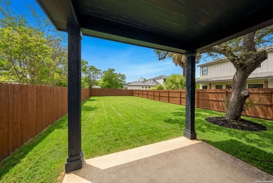 Exterior details and patio area of a home in , San Antonio (Image 33).