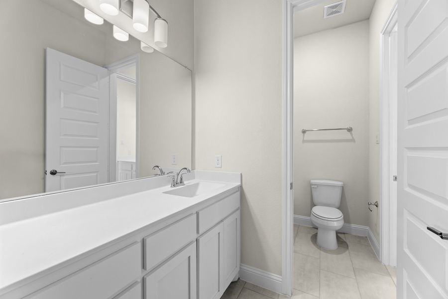Representative furnished interior of a home built from the Wildwood SE by Sandlin Homes in Settler's Glen, New Fairview (Image 12).