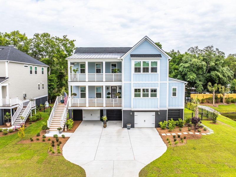 Front exterior of a new home in , Mount Pleasant, SC, highlighting curb appeal (Image 26).