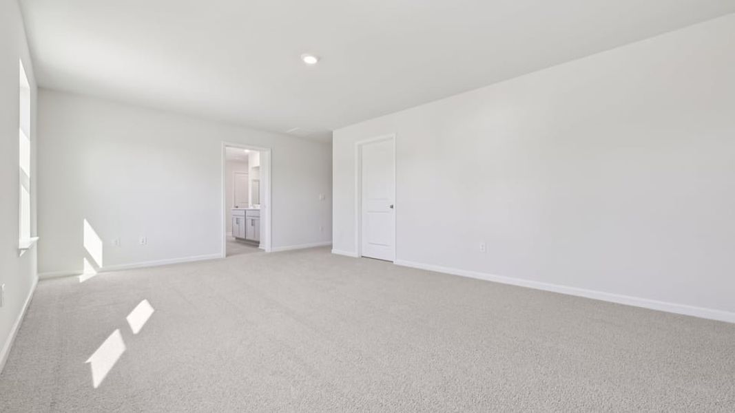 Spacious, unfurnished interior of a new home in Gretchen Pines, West End (Image 17).