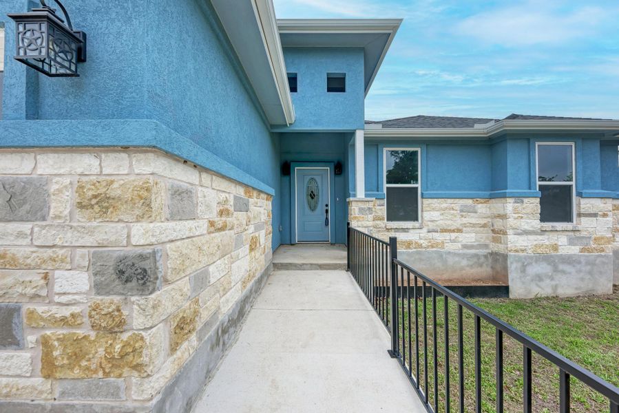Exterior details and patio area of a home in , Paige (Image 3).