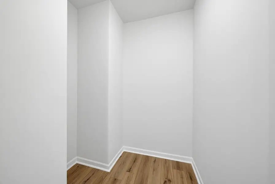 Spacious, unfurnished interior of a new home in Sweetbrier, Durham (Image 20).