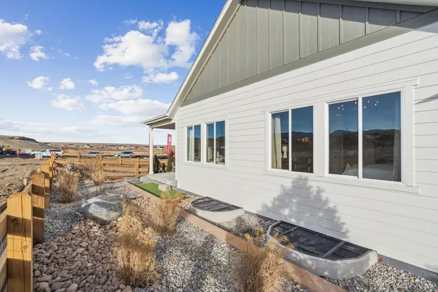 Exterior details and patio area of a home in Trailstone, Arvada (Image 25).