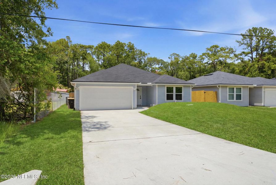 Front exterior of a new home in , Jacksonville, FL, highlighting curb appeal (Image 24).