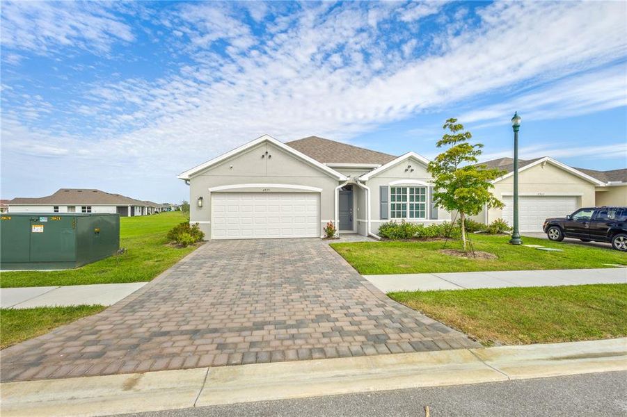 Front exterior of a new home in , North Port, FL, highlighting curb appeal (Image 23).