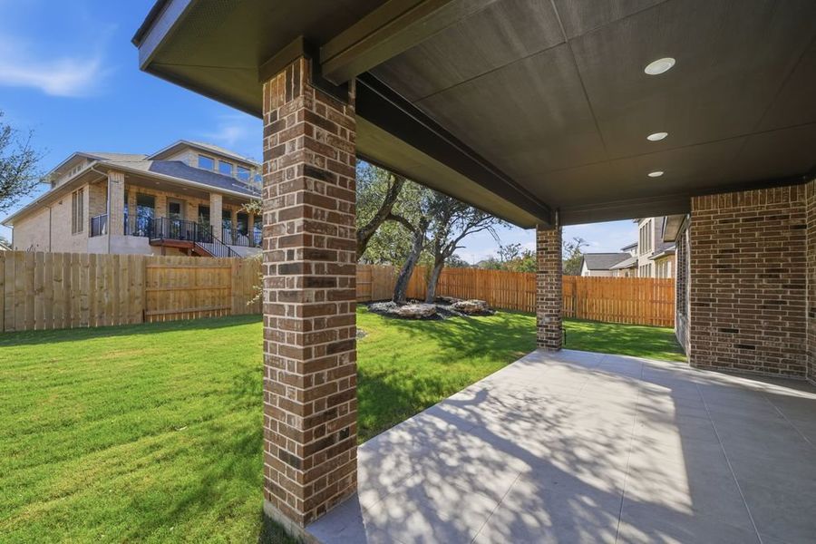 Exterior details and patio area of a home in Parkside on the River 60s, Georgetown (Image 4).